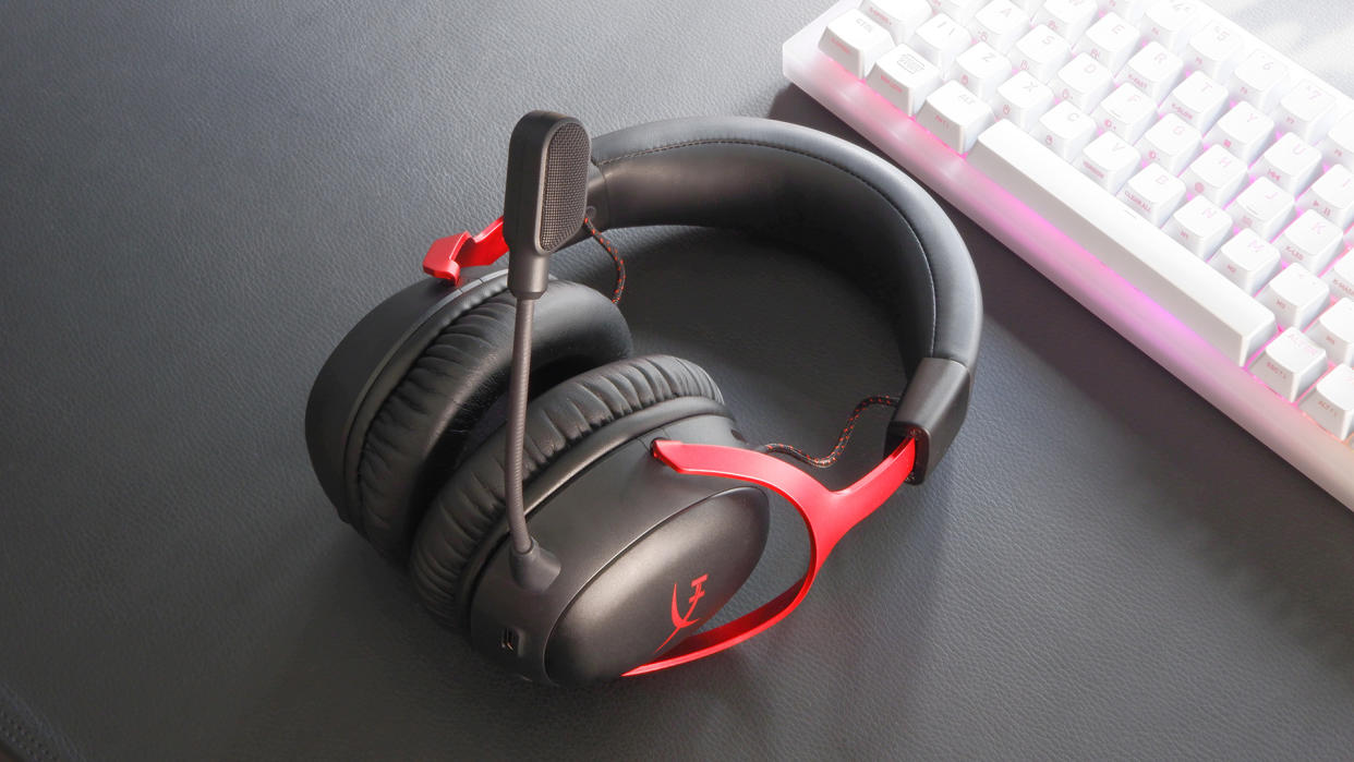  HyperX Cloud III Wireless gaming headset on a desk. 