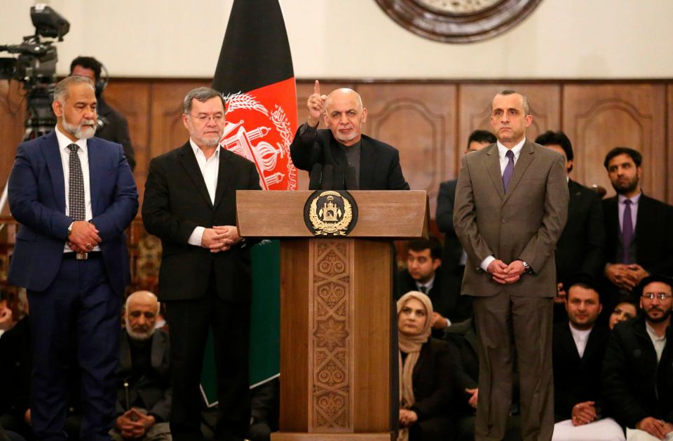 Afghan presidential candidate Ashraf Ghani, center, gives a speech during a press conference after the announcement of the preliminary elections results in Kabul on Dec. 22, 2019.