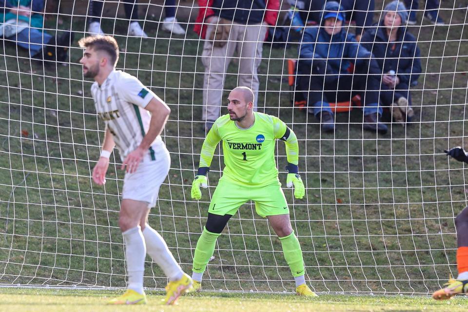 Vermont goalie Nate Silveira (1) and Garrett Lillie defend during the Catamounts' 2-1 loss to Syracuse in the NCAA Tournament quarterfinals on Saturday, Dec. 3, 2022.