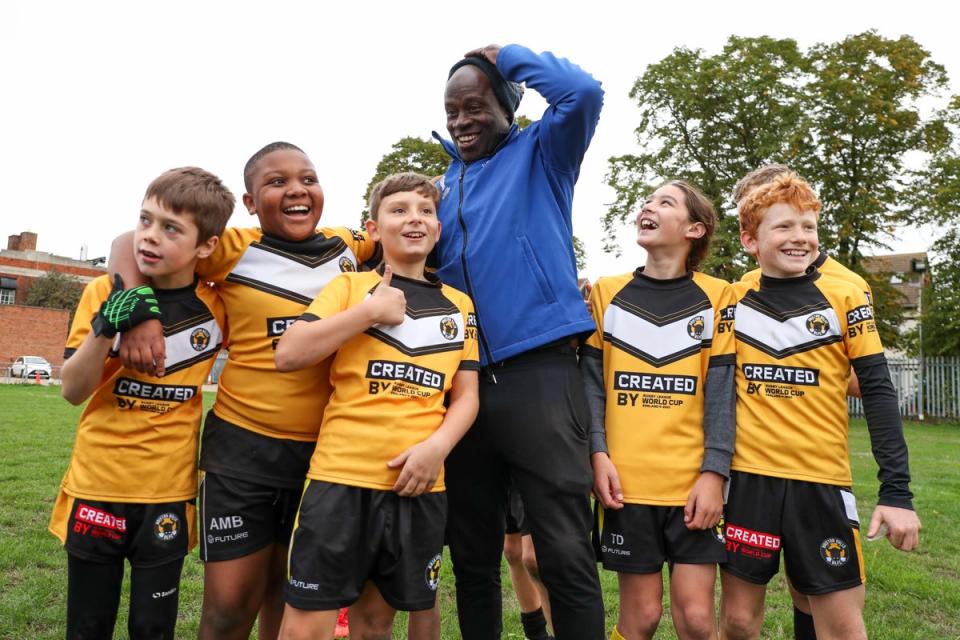 Martin Offiah with Brixton Bulls players in south London to celebrate The National Lottery being the official partner of the Rugby League World Cup (Kieran Cleeves/PA) (PA Wire)