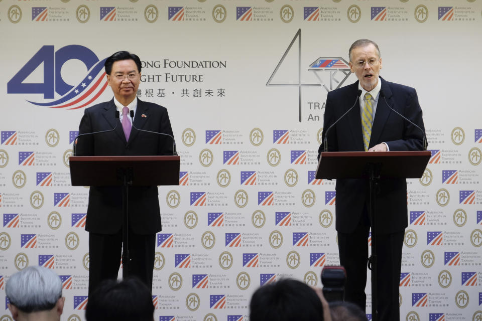 Taiwan Foreign Minister Joseph Wu, left, and American Institute in Taiwan (AIT) director William Brent Christensen attend a press conference in Taipei, Taiwan Tuesday, March 19, 2019. Taiwan and the U.S. will hold talks later this year as part of efforts to counter growing pressure from Beijing to force the island into political unification with mainland China. (AP Photo/Johnson Lai)