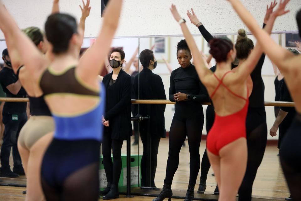 Director and Choreographer Julie Branam, center left, and Rockettes Dance Captain and Assistant Choreographer Danelle Morgan, center right, watch dancers on the second day of auditions to be a Rockette in the Christmas Spectacular or for an offer to attend the invite-only Rockettes conservatory program, April 19, 2022 at Radio City Music Hall in New York City. The Radio City Rockettes are taking steps to diversify their kickline by partnering with dance companies, conservatories and colleges.