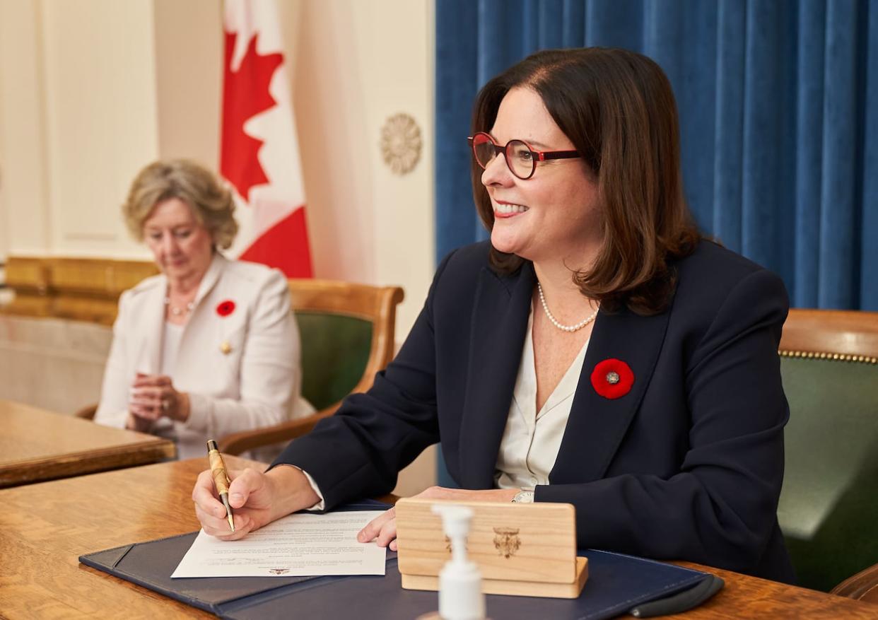 Heather Stefanson, seen in 2021 during her swearing-in ceremony, was the first woman to serve as premier of Manitoba. (David Lipnowski/The Canadian Press - image credit)