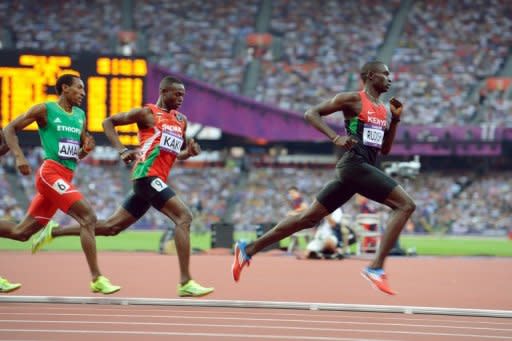 Kenya's David Rudisha (right) races towards the finishing line in the Olympic 800m. Kenya's under-fire Olympic team received a tumultous welcome home from family and friends on Wednesday, even as the government announced an inquest on the poor showing at the London Games