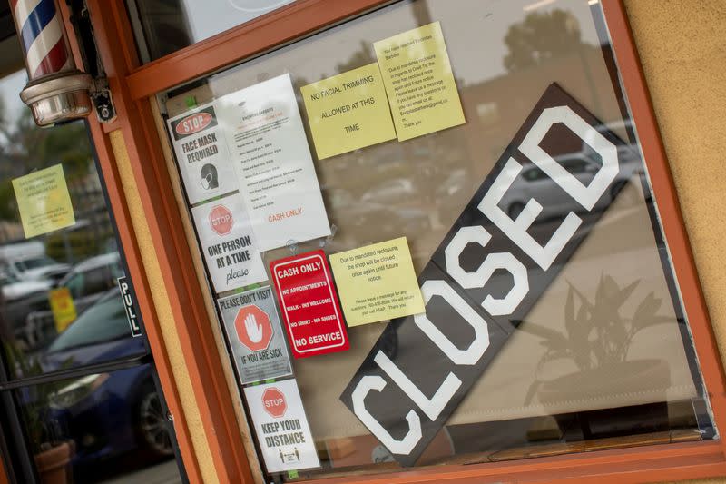 FILE PHOTO: A closed barber shop is shown during the outbreak of the coronavirus disease in California