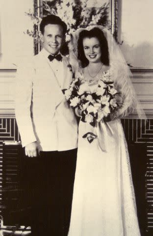 <p>Jill Brady/Portland Press Herald via Getty Images</p> Jim Dougherty and Norma Jeane Baker on their wedding day in 1942.