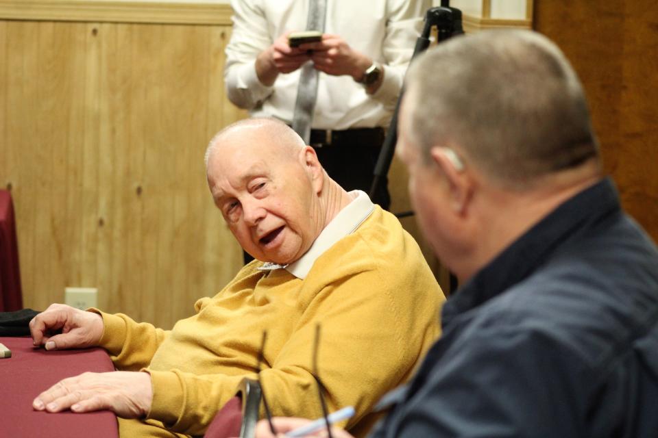 Retired Air Force Master Sergent Joe Fletcher (left) tells Sen. Tester about his difficulties in receiving medications for his Type II diabetes through TriCare