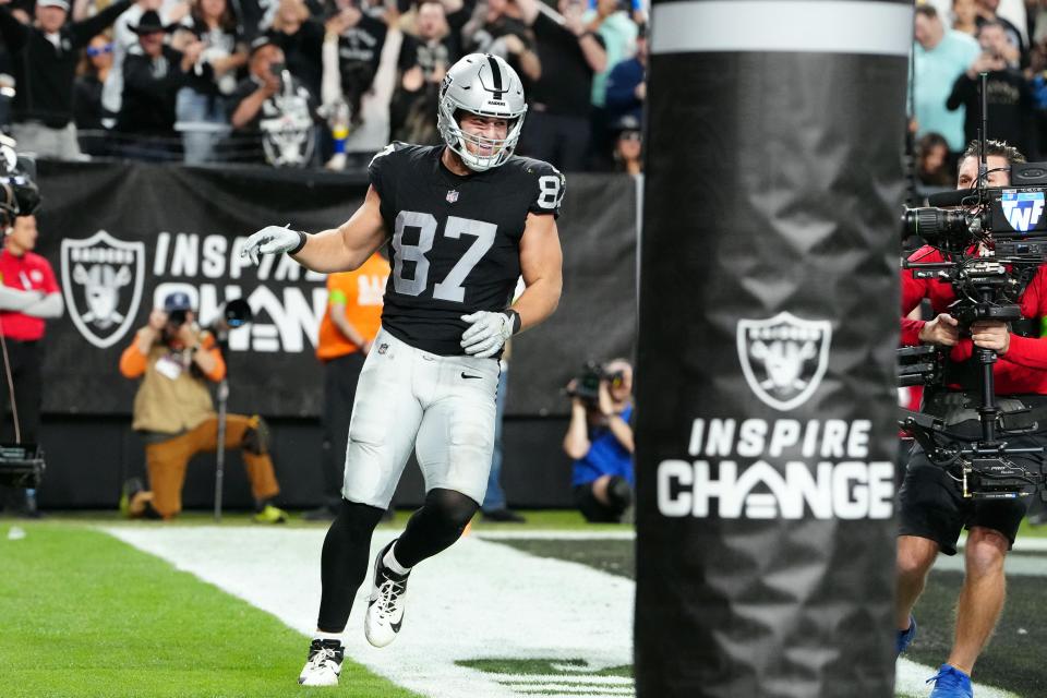 Dec 14, 2023; Paradise, Nevada, USA; Las Vegas Raiders tight end Michael Mayer (87) celebrates after scoring a touchdown in the second quarter against the Los Angeles Chargers at Allegiant Stadium.