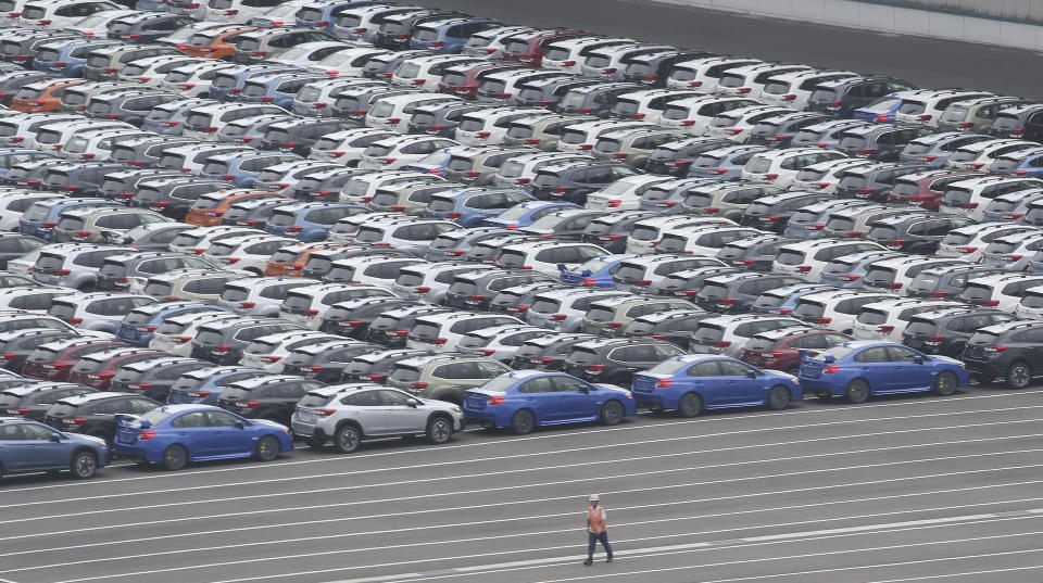 Subaru cars for export park at Kawasaki port, near of Tokyo, Monday, July 8, 2019. Among the challenges awaiting Prime Minister-elect Yoshihide Suga is the urgent challenge of how to keep the world’s third-largest economy growing as its population ages and shrinks. (AP Photo/Koji Sasahara)