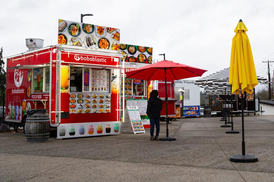 Checkpoint 221 features more than a dozen food carts to try.