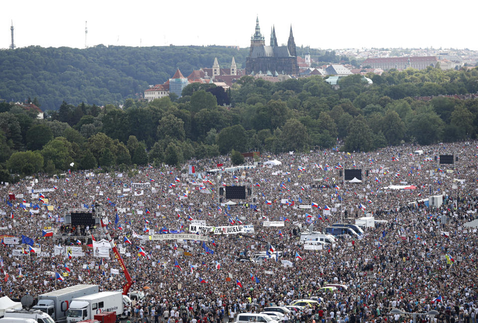 People gather for a protest in Prague, Czech Republic, Sunday, June 23, 2019. Protesters are on calling on Czech Prime Minister Andrej Babis to step down over fraud allegations and subsidies paid to his former companies. (AP Photo/Petr David Josek)