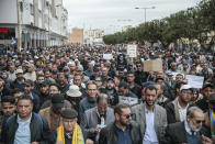 Thousands of Moroccans take part in a demonstration in Rabat, Morocco, Sunday, April 21, 2019. Protesters are condemning prison terms for the leader of the Hirak Rif protest movement against poverty and dozens of other activists. (AP Photo/Mosa'ab Elshamy)