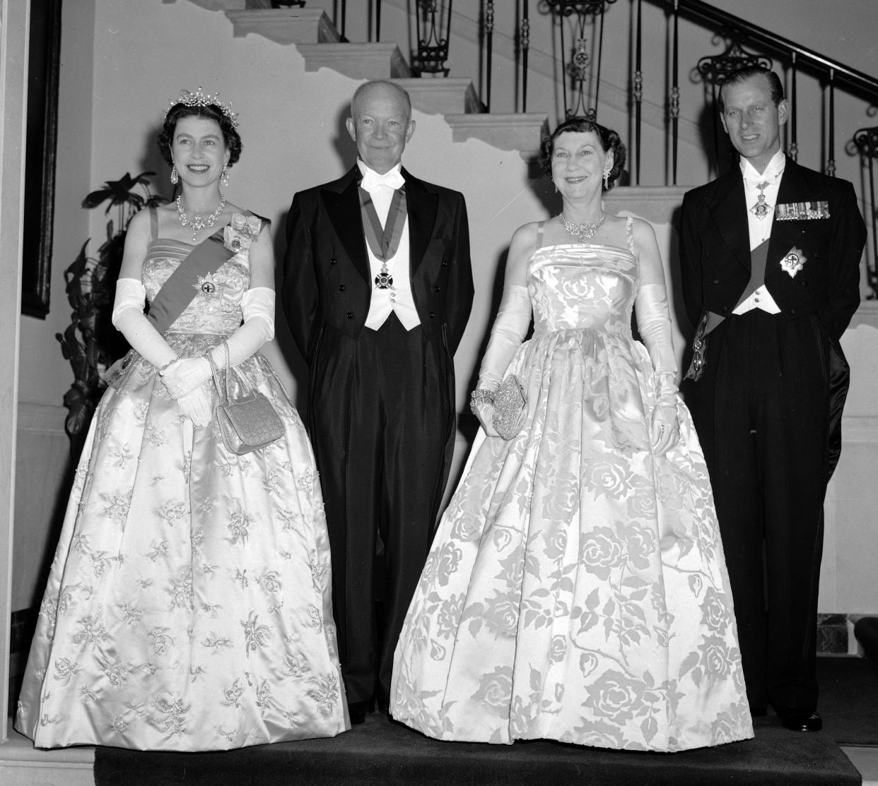 President Dwight Eisenhower and first lady Mamie are flanked by their royal guests, Queen Elizabeth and her husband, Prince Philip, at the White House, Oct. 17, 1957.