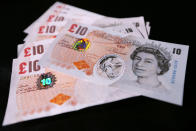 Samples of Polymer ten pound banknotes are shown during the news conference at the Bank of England in London during a consultation on plans to issue plastic bank notes within the next three years.