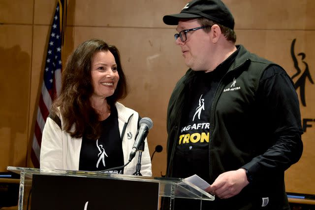 <p>CHRIS DELMAS/AFP via Getty</p> SAG-AFTRA President Fran Drescher and National Executive Director/Chief Negotiator Duncan Crabtree-Ireland speak during a press conference at the labor union's headquarters in Los Angeles on July 13, 2023