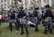 <p>Police detain protesters during a demonstration in downtown Moscow, Russia, Monday, June 12, 2017. (Pavel Golovkin/AP) </p>