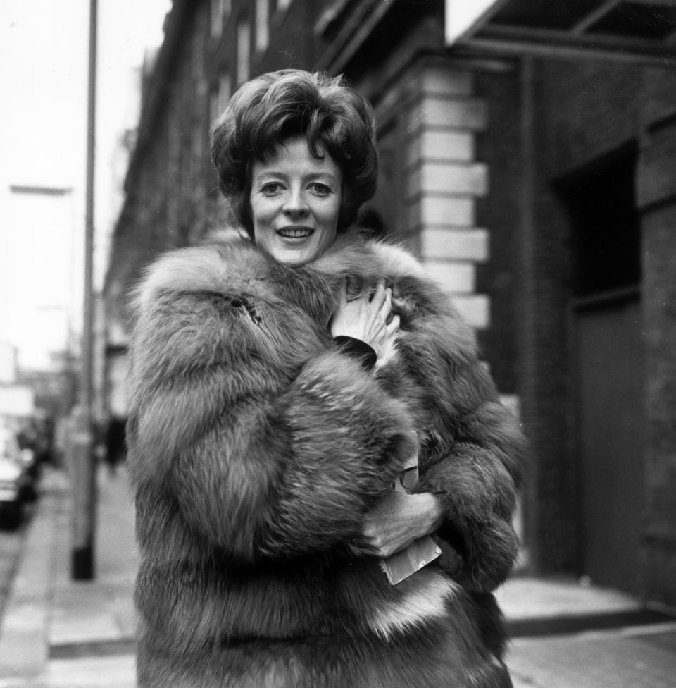 Maggie wearing a fur coat