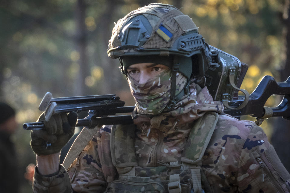A soldier of Ukraine's National Guard 1st brigade Bureviy (Hurricane) looks on during combat training at a military training ground in the north of Ukraine Friday, Nov. 3, 2023. (AP Photo/Efrem Lukatsky)