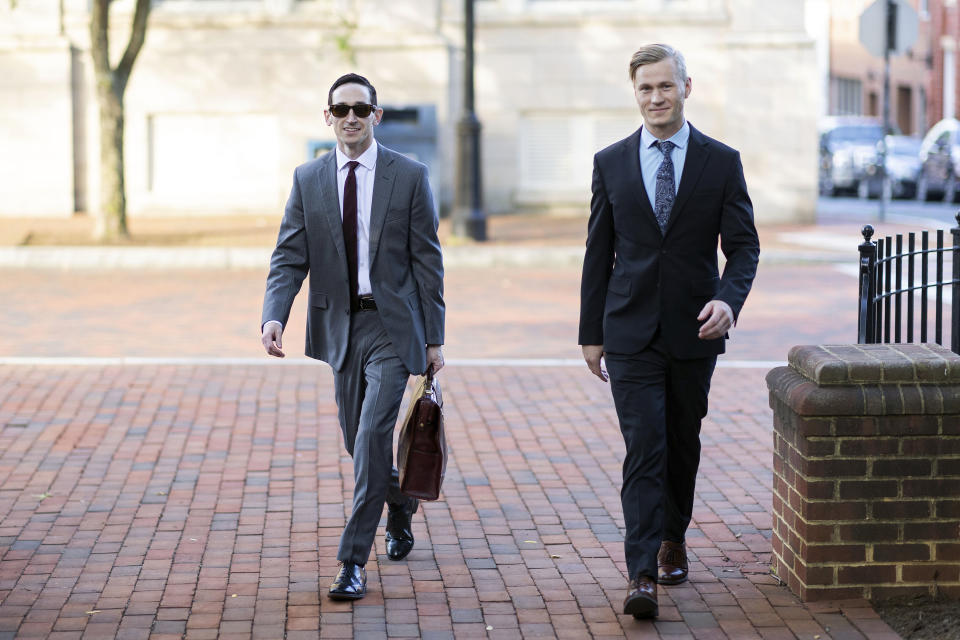 Peter Frazier and Jacob Joseph Dix arrive at the Albemarle County Circuit Court in Charlottesville, Va., Tuesday, June 4, 2024. Years after a white nationalist rally erupted in violence in Charlottesville, a trial is set to begin Tuesday for Dix ,one of the people charged with using flaming torches to intimidate counterprotesters. (AP Photo/Ryan M. Kelly)