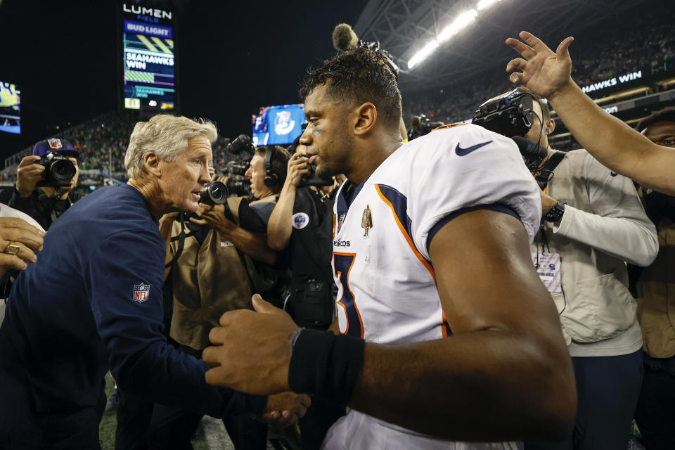 Russell Wilson spent 10 years with Pete Carroll in Seattle before being traded to Denver. (Photo by Steph Chambers/Getty Images)