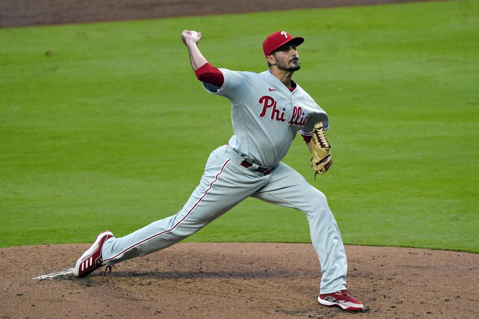 Philadelphia Phillies starting pitcher Zach Eflin (56) works against the Atlanta Braves in the first inning of a baseball game Saturday, April 10, 2021, in Atlanta. (AP Photo/John Bazemore)