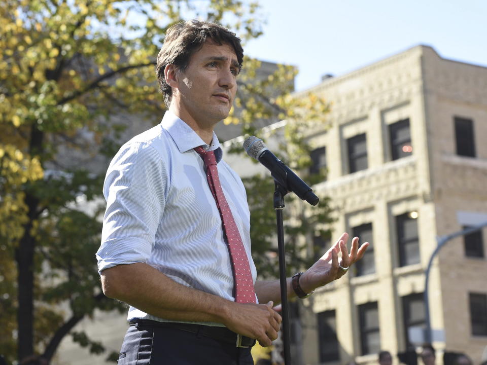 Canada's Prime Minister Justin Trudeau addresses the media in Winnipeg, Manitoba, Thursday, Sept. 19, 2019. Trudeau's campaign was hit Wednesday by the publication of a yearbook photo showing him in brownface makeup at a 2001 costume party. The prime minister apologized and said "it was a dumb thing to do." (Sean Kilpatrick/The Canadian Press via AP)