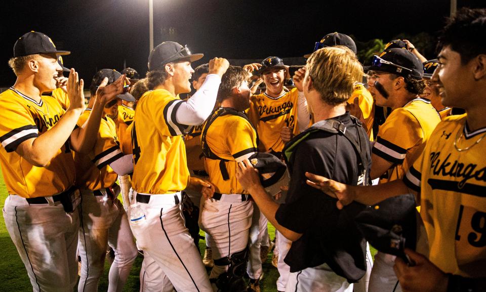 Members of the Bishop Verot baseball team celebrates a 4-2 win over Clearwater Central Catholic in Class 3A, Region 2 quarterfinal at Bishop Verot in Fort Myers on Tuesday, May 6, 2023.  