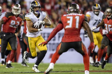 Sep 24, 2018; Tampa, FL, USA; Pittsburgh Steelers running back James Conner (30) runs the ball during the first half against the Tampa Bay Buccaneers at Raymond James Stadium. Mandatory Credit: Douglas DeFelice-USA TODAY Sports