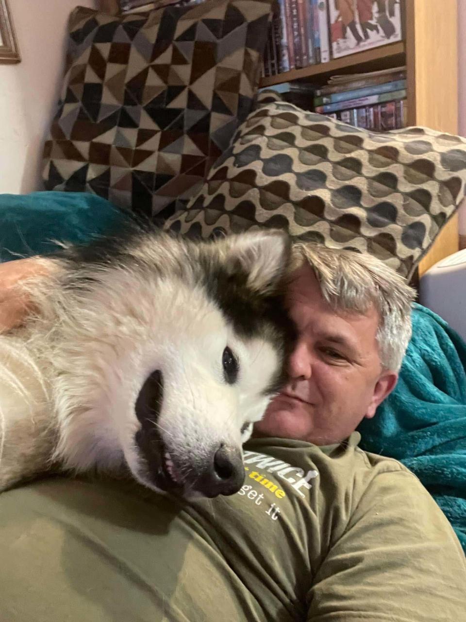 Wilson takes a selfie with his favorite canine, Loki.