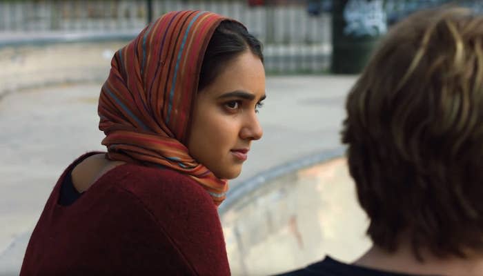 Geraldine Viswanathan and Jack Kilmer talk at a skate park