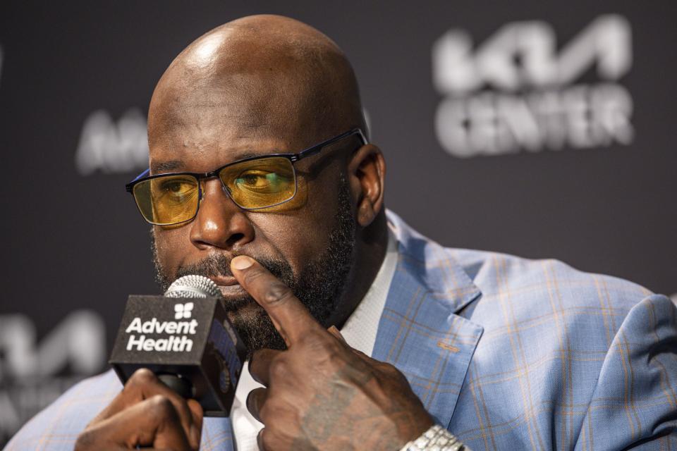 Shaquille O'Neal, speak during a pre-game press conference about the Orlando Magic retiring his jersey before the Oklahoma City Thunder NBA basketball game, Tuesday, Feb. 13, 2024, in Orlando, Fla. (AP Photo/Kevin Kolczynski)