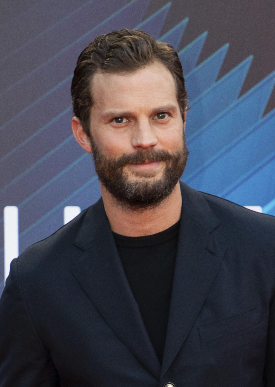 FILE - Jamie Dornan appears at the premiere of "Belfast" during the 2021 BFI London Film Festival in London on Oct. 12, 2021. Dornan stars in The BBC series “The Tourist” which will air in the U.S. on HBO Max later this year. (Photo by Vianney Le Caer/Invision/AP, File)