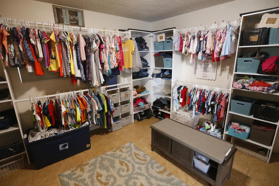 Inside the donation center is a room filled with children's clothes for children of families coming into the House of Refuge in Mesa.