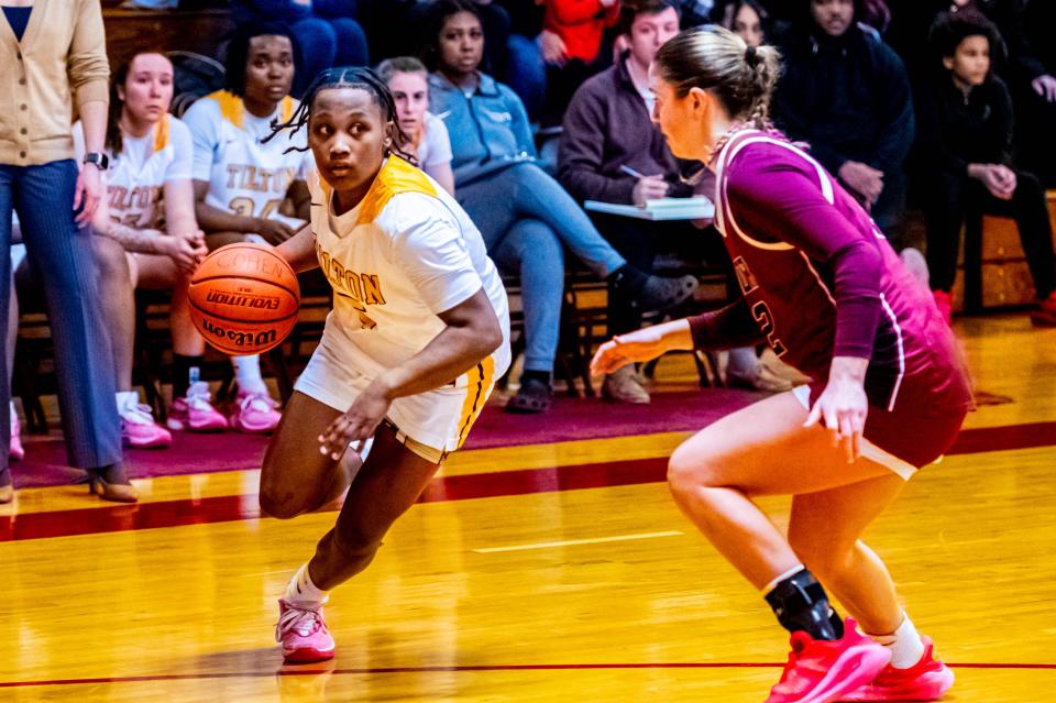 Tilton's Ahnay Adams drives to the basket.