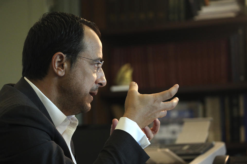 Cyprus' foreign minister Nikos Christodoulides speaks with the Associated Press during an interview at his office in Nicosia, Cyprus, Wednesday, Aug. 5, 2020. Christodoulides says the European Union must do more to fill a power vacuum in the eastern Mediterranean brought on by a perceived U.S. disengagement from the region. (AP Photo/Giorgos Christoforou)