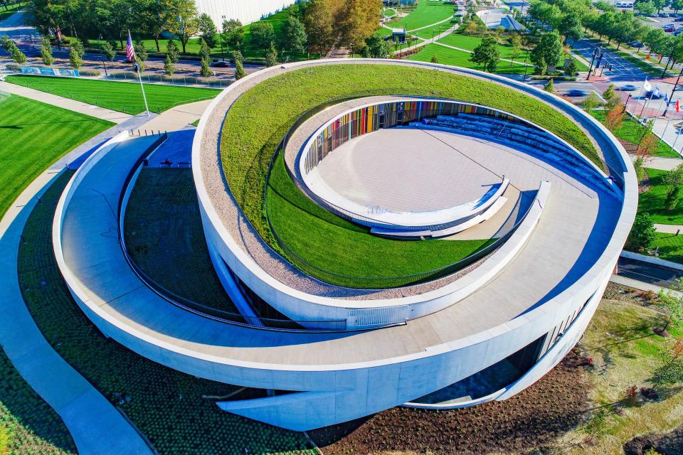 An aerial view shows the rooftop sanctuary, a place where visitors can sit and reflect while enjoying views of the surrounding cityscape.