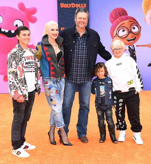 Gwen, Blake and her three sons on a red carpet