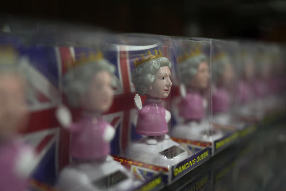 Toy figures of Queen Elizabeth II are displayed for sale at a gift shop in London, Monday, Sept. 12, 2022. Just days after the death of Queen Elizabeth II, unofficial souvenirs have rolled out at royal-themed gift shops in London and online marketplaces like Amazon and Etsy. (AP Photo/Kin Cheung)