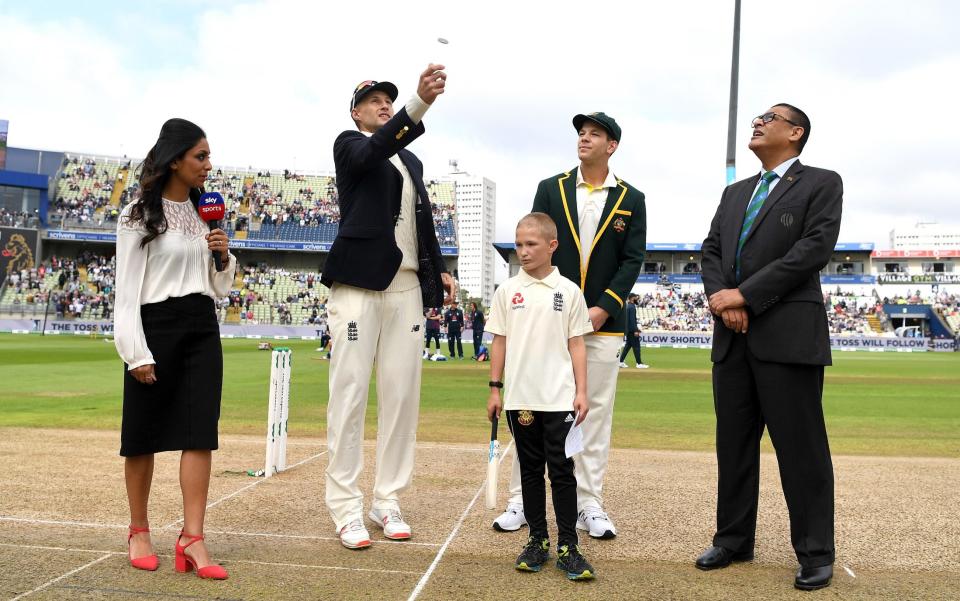 England captain Joe Root tosses the coin alongside Australia captain Tim Paine - GETTY IMAGES