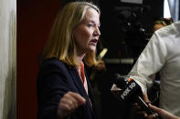 Democrat Kris Mayes, candidate Arizona Attorney General, speaks with the media after a televised debate against Republican Abraham Hamadeh, Wednesday, Sept. 28, 2022. (AP Photo/Ross D. Franklin)