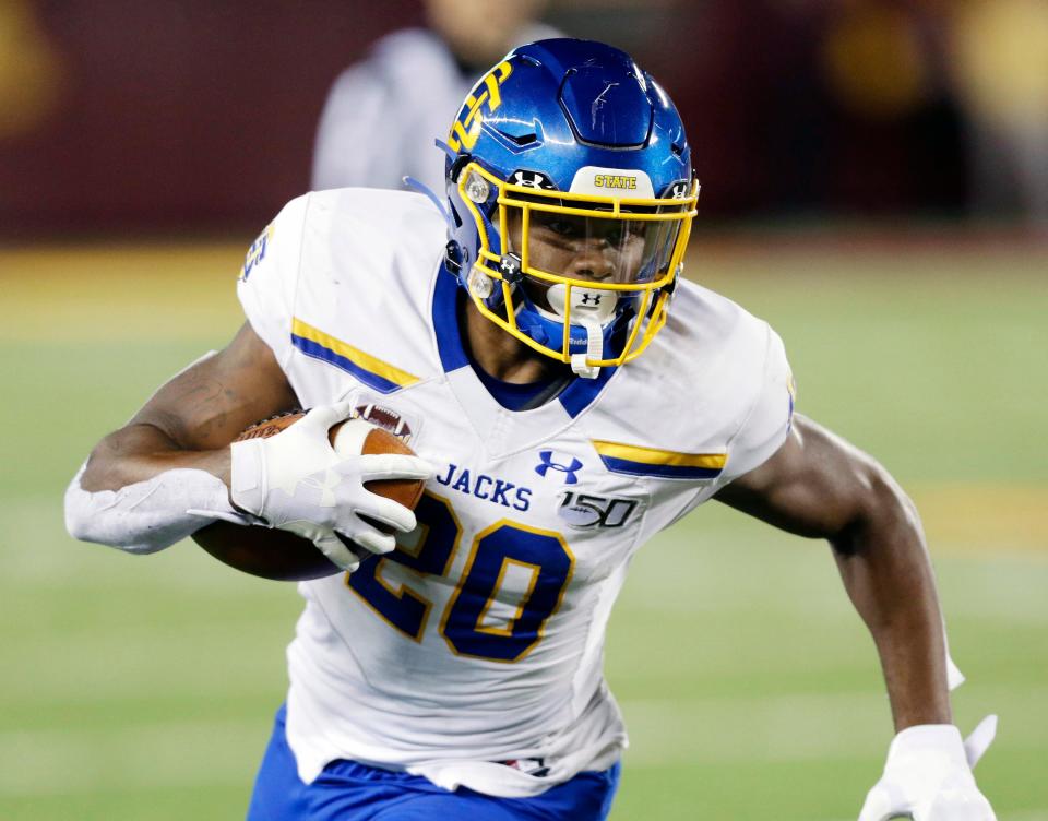 FILE - South Dakota State running back Pierre Strong runs with the ball during an NCAA football game against Minnesota, Aug. 29, 2019, in Minneapolis. Strong was selected to The Associated Press FCS All-America team. (AP Photo/Andy Clayton- King, File)