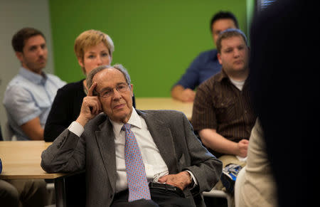 William Perry, a former U.S. Secretary of Defense, listens as Deputy Secretary of Defense Ash Carter speaks to students at Acuitus, a firm that trains veterans in software programming, in Palo Alto, California, U.S., April 17, 2013. Picture taken April 17, 2013. To Match Special Report USA-NUCLEAR/ICBM Department of Defense/Glenn Fawcett/Handout via REUTERS