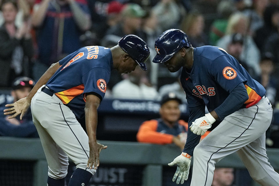 Houston Astros' Yordan Alvarez (44) celebrates after hitting a two-run home run in the sixth inning of a baseball game against the Atlanta Braves, Saturday, April 22, 2023, in Atlanta. (AP Photo/Brynn Anderson)