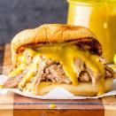 <p><strong>Pulled Pork Sandwich with Mustard Sauce</strong></p><p>What’s different about South Carolina’s Pulled Pork Sandwich with Mustard Sauce is -- in fact the tangy mustard base. It’s all about the sauces at <a href="http://southernbellybbq.com/" rel="nofollow noopener" target="_blank" data-ylk="slk:Southern Belly BBQ;elm:context_link;itc:0;sec:content-canvas" class="link ">Southern Belly BBQ</a> -- including the Midas (inspired by South Carolina liquid gold) and the Castro sandwich which tops the pork with pickles, banana peppers and Swiss cheese.</p>