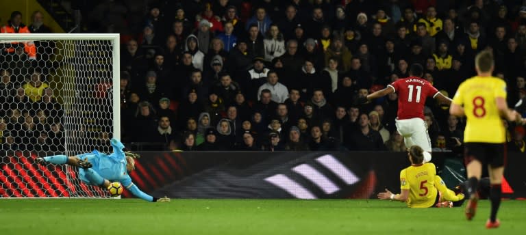 Manchester United's Anthony Martial (R) scores their third goal in a 4-2 win over Watford