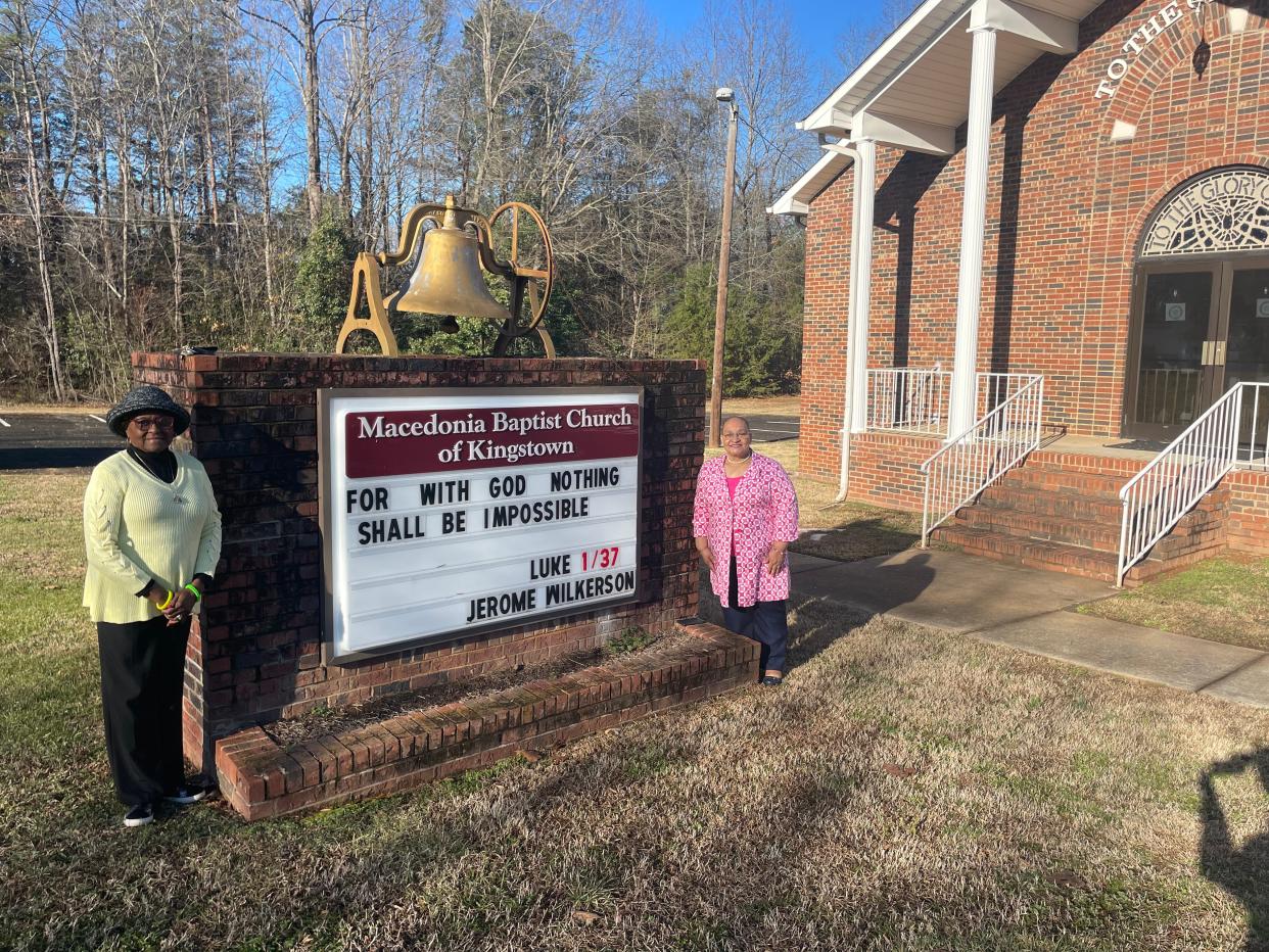 Sharon Martin, Kingstown's mayor pro tem, and Janet Gerald, mayor, stand in front of Macedonia Baptist Church where the founding fathers of the town met to discuss the future name of the town. It is the only one in the nation named after Dr. Martin Luther King Jr.