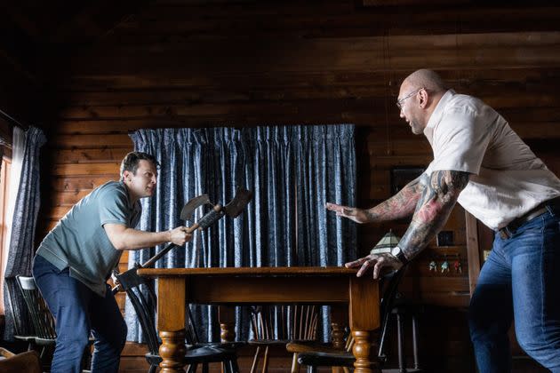 Jonathan Groff, left, tries to defend himself against an unhinged Dave Bautista in 