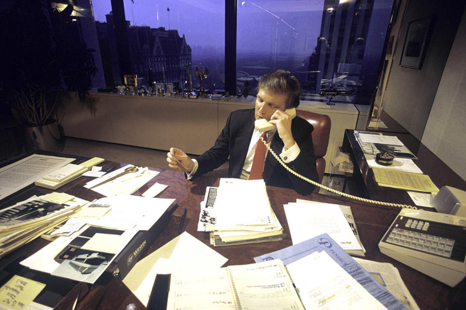 Donald Trump, in his office in 1987, had a direct line to all the big gossip writers in the city. (Photo: Joe McNally/Getty Images)