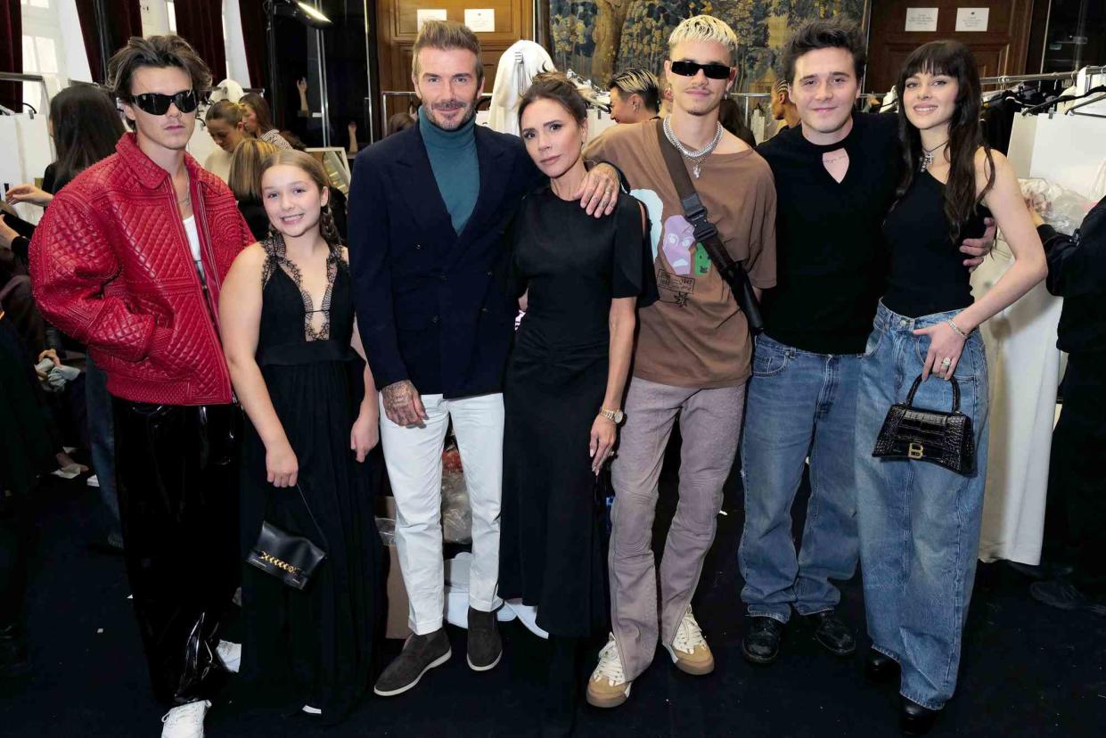 <p>Darren Gerrish/WireImage</p> (L-R) Cruz Beckham, Harper Beckham, David Beckham, Victoria Beckham, Romeo Beckham, Brooklyn Beckham and Nicola Peltz Beckham