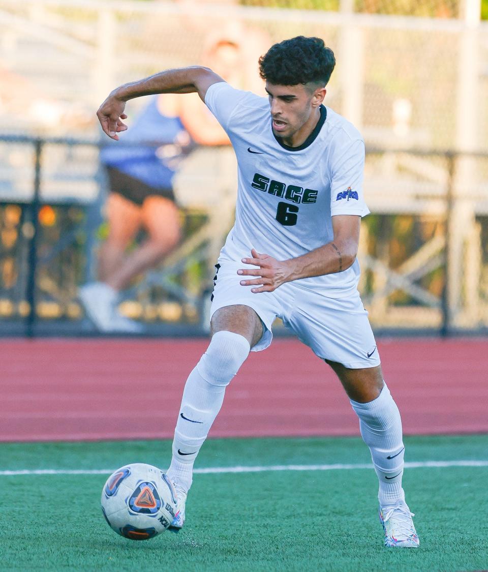 Matt Rabadi, who played for the Sage College men's soccer team, dribbles the ball up field during a game in fall 2021.